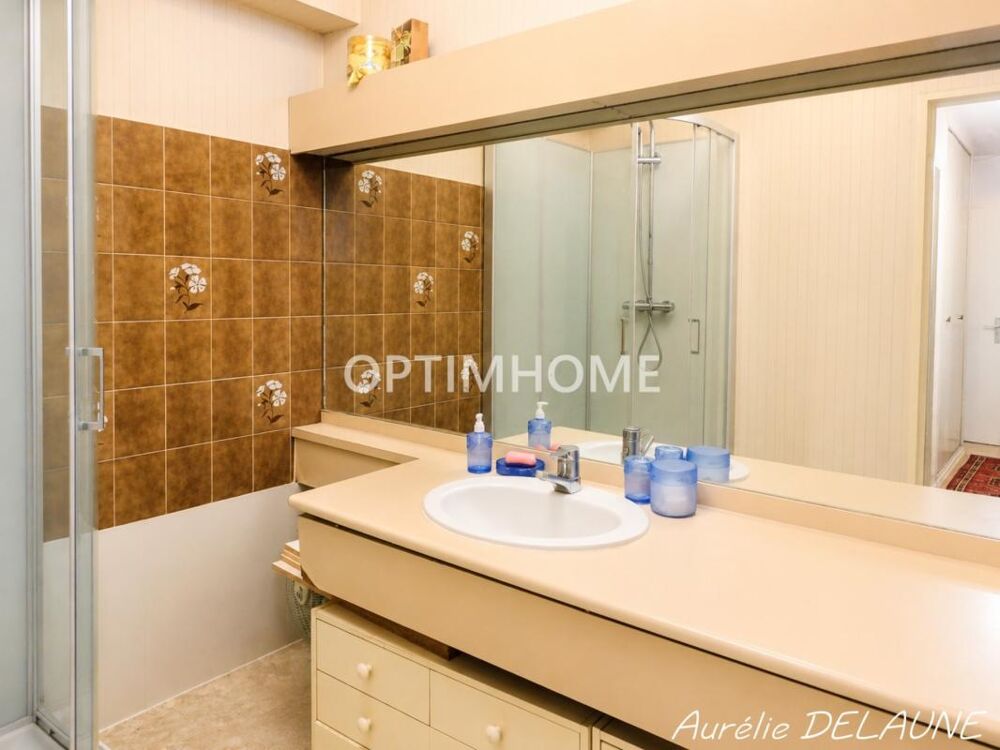 Appartement 92m2 - T4 - 2 chambres - Balcon - Cave - Box - Proche centre-ville et gare RER D