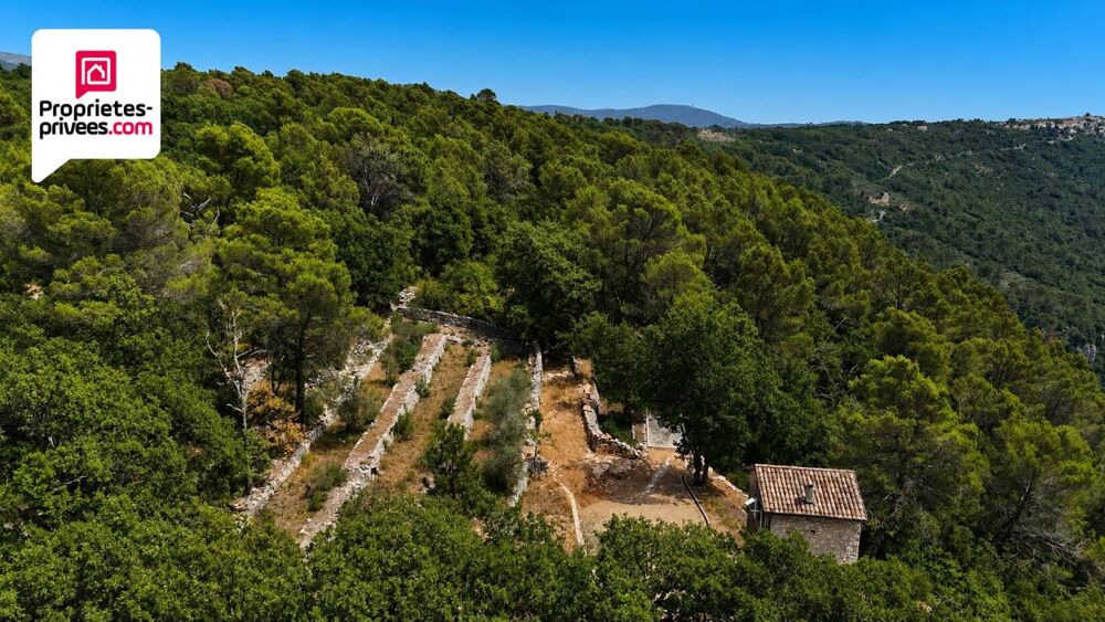 Vente Terrain TOUR EN PIERRES AMENAGEE AVEC TERRAIN DE 7 HECTARES ET VUE PANORAMIQUE SUR LA VALLEE DE LA SIAGNE Saint cezaire sur siagne