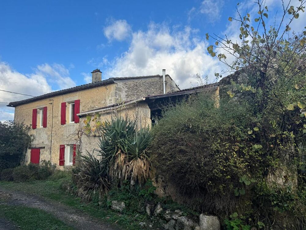 maison en pierre avec dépendance