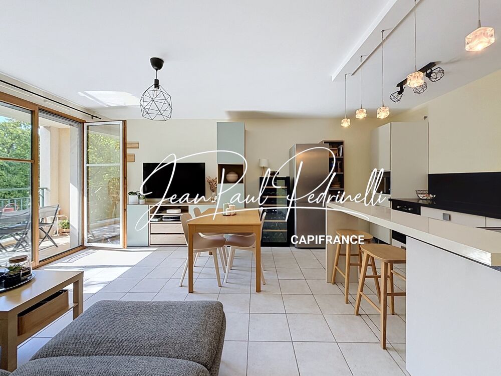 Tassin-la-Demi-Lune - Appartement 2 pièces de 48 m² avec balcon, parking privatif et cave - résidence sécurisée récente