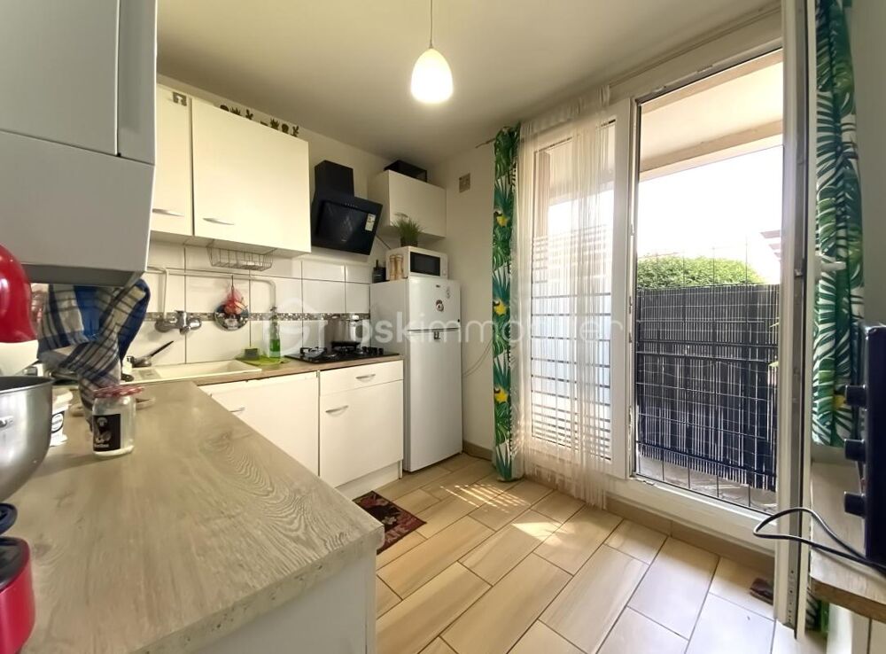 Appartement à GRENOBLE de type T2 en rez de chaussée