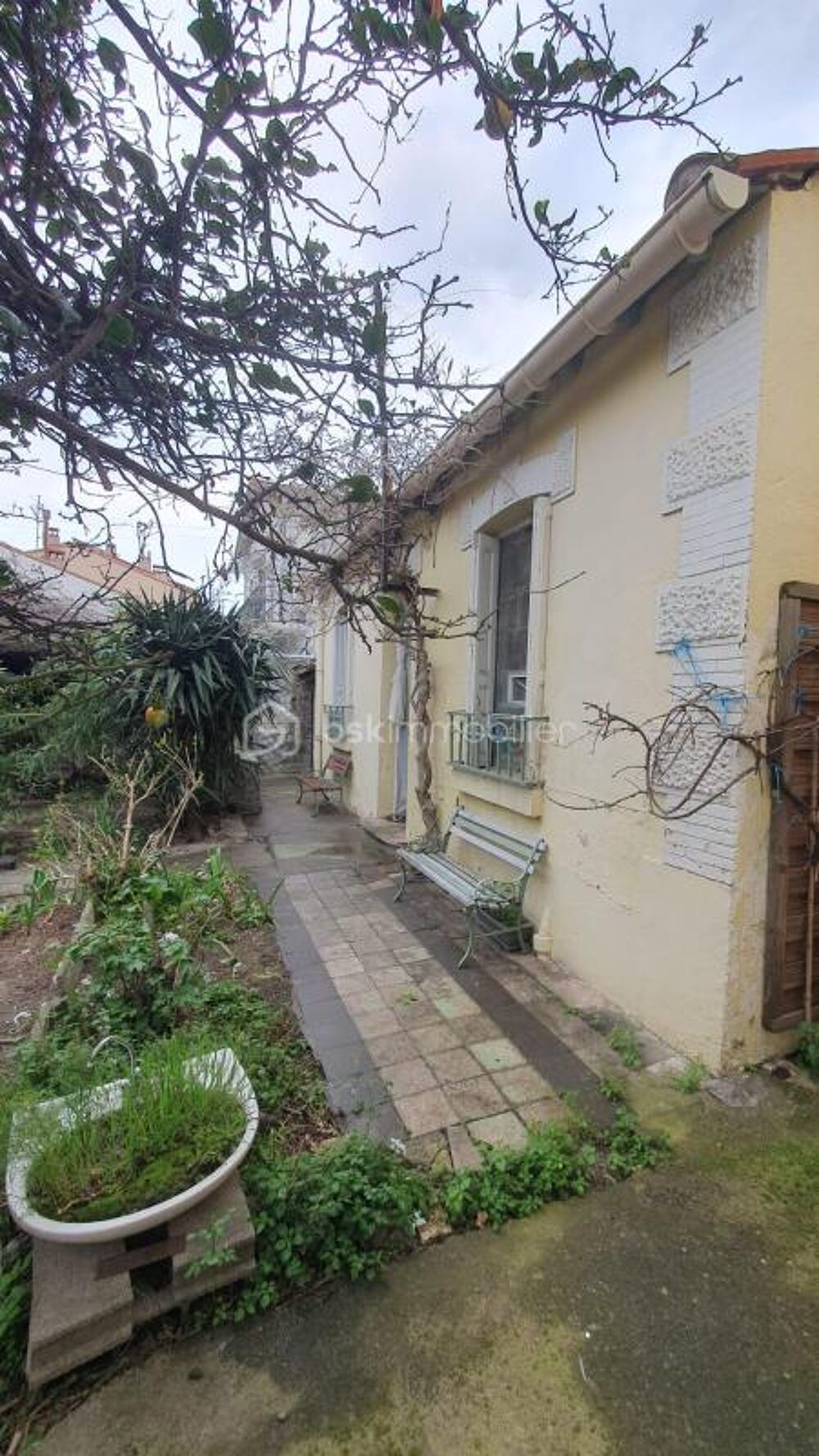 Charmante maison des années 1920 avec double terrasse en vente à découvrir !