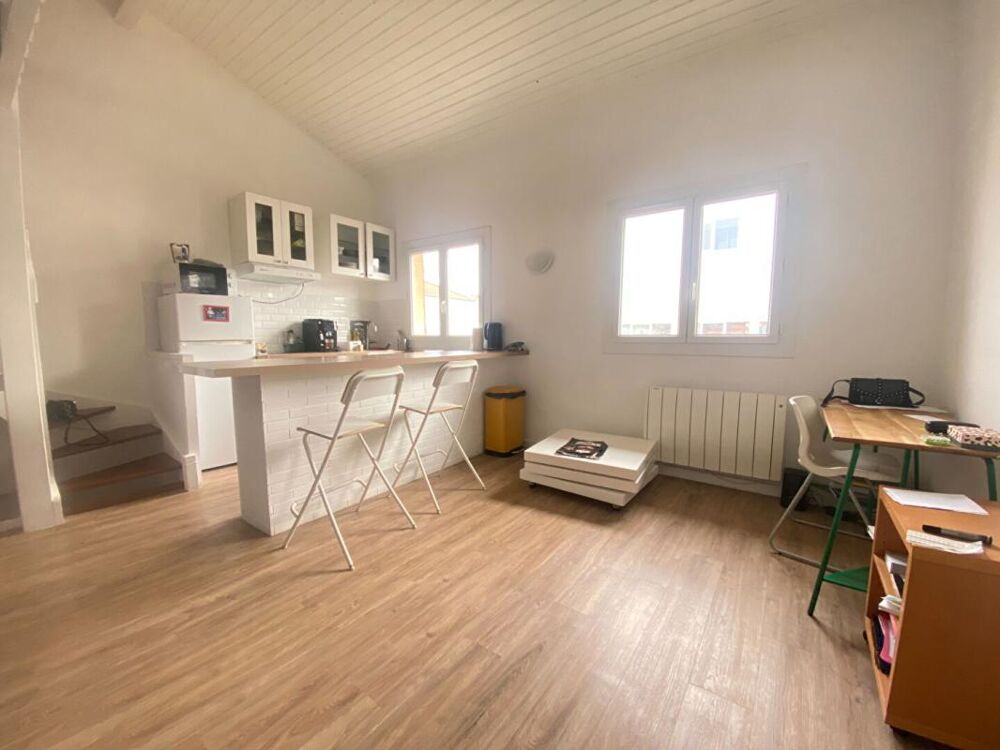 Maison divisée en deux appartements avec jardinet