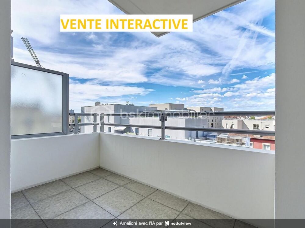 Vente interactive - Bel appartement 2 pièces rénové avec grand balcon, vue dégagée et garage  Villeurbanne Maisons Neuves