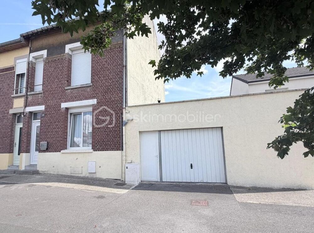 Maison familiale de 107 m² avec garage, jardin et dépendances à Saint-Quentin