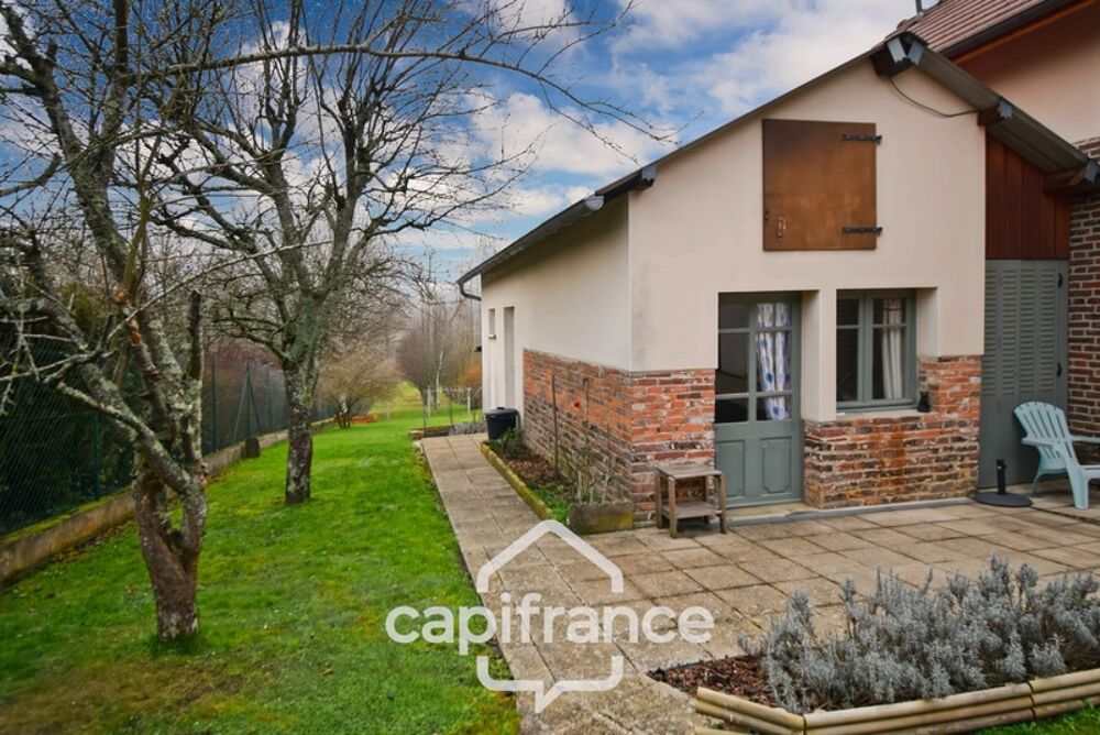 Maison de plain-pied entièrement rénovée avec jardin clos, dépendance et charme authentique  Secteur LONS LE SAUNIER (39000), B