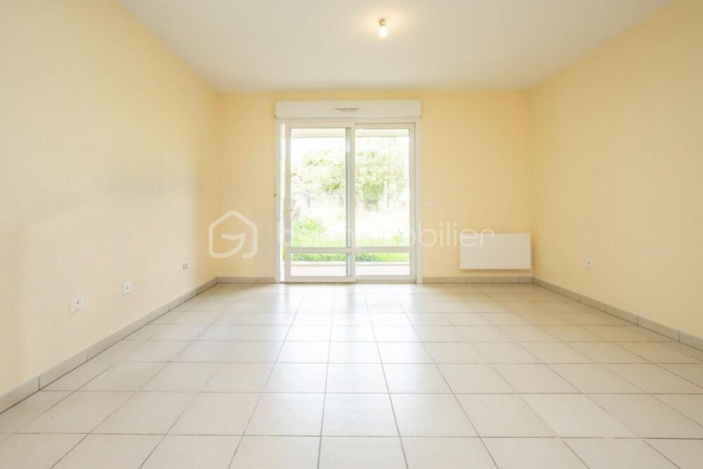 Appartement en rez-de-jardin avec parking