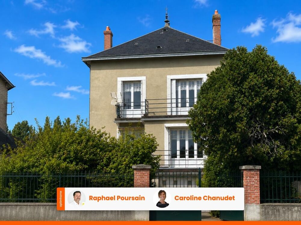 Maison à double distribution avec 2 garages et 1000m2 de terrain clos