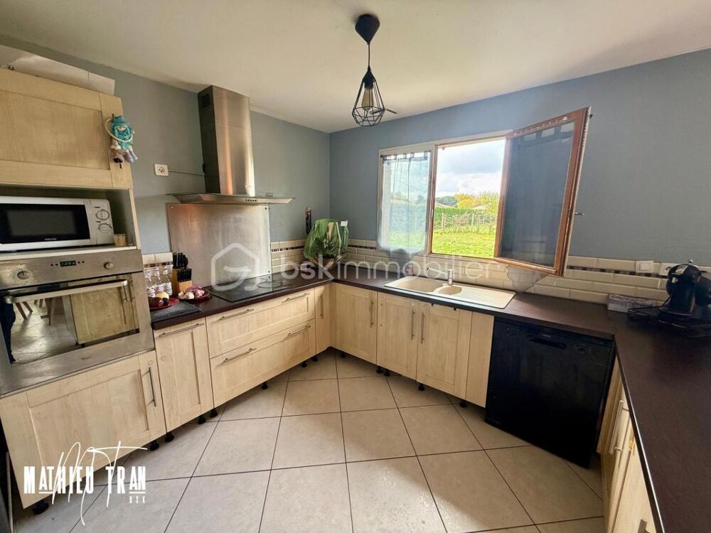 Chaleureuse maison à vendre dans un cadre enchanteur