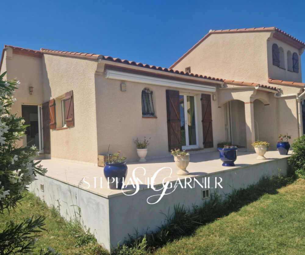 Villa 4 faces, grand jardin et garage