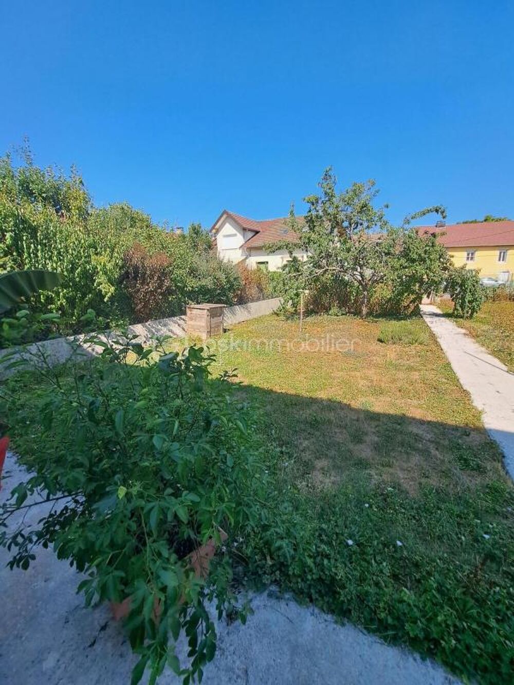 Vente Maison Maison de ville avec jardin, véranda et fort potentiel – À deux pas du centre-ville ! Champagnole