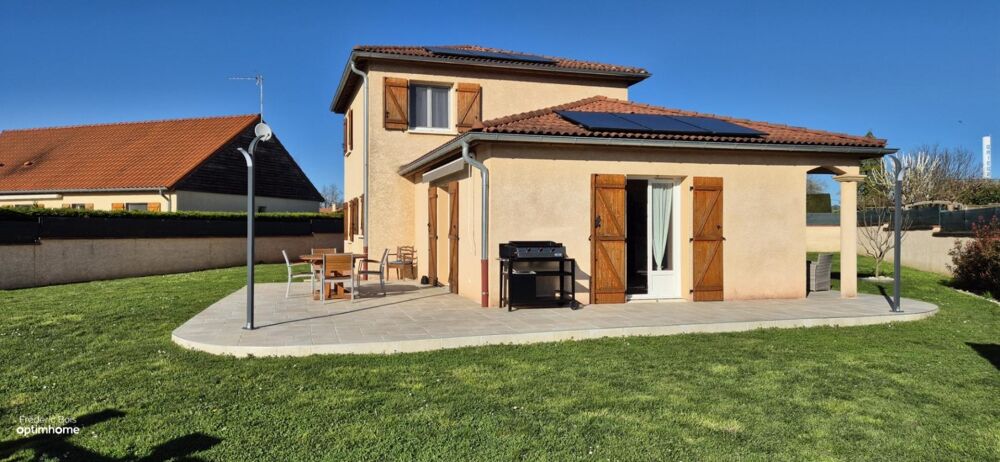 Maison familiale 4 chambres centre Grièges sur joli terrain clos