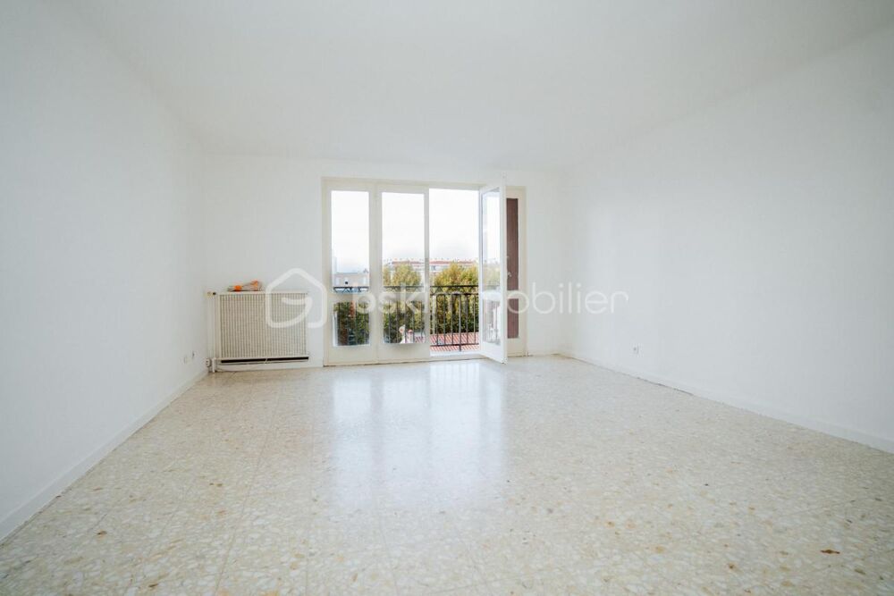 Appartement T3 74 m²  2 balcons + 2 parking  6? étage - avec ascenseur