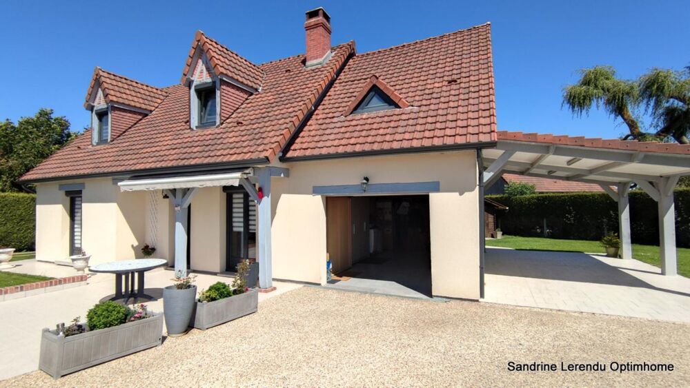 Une maison clé en main avec véranda contemporaine et possibilité de vivre de plain-pied.  2 garages  Terrain 807 m²  Saint-Ou