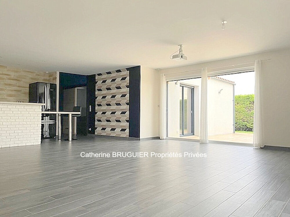 Maison de plain-pied 116 m² - Centre village - Classe A -3 chambres - garage - jardin clos