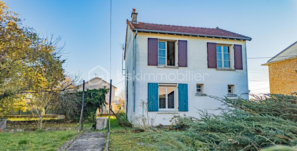 Agréable maison de ville à rafraichir (avec coin terrasse, terrain/jardin, cave, garage-atelier indépendant et petite dépendance