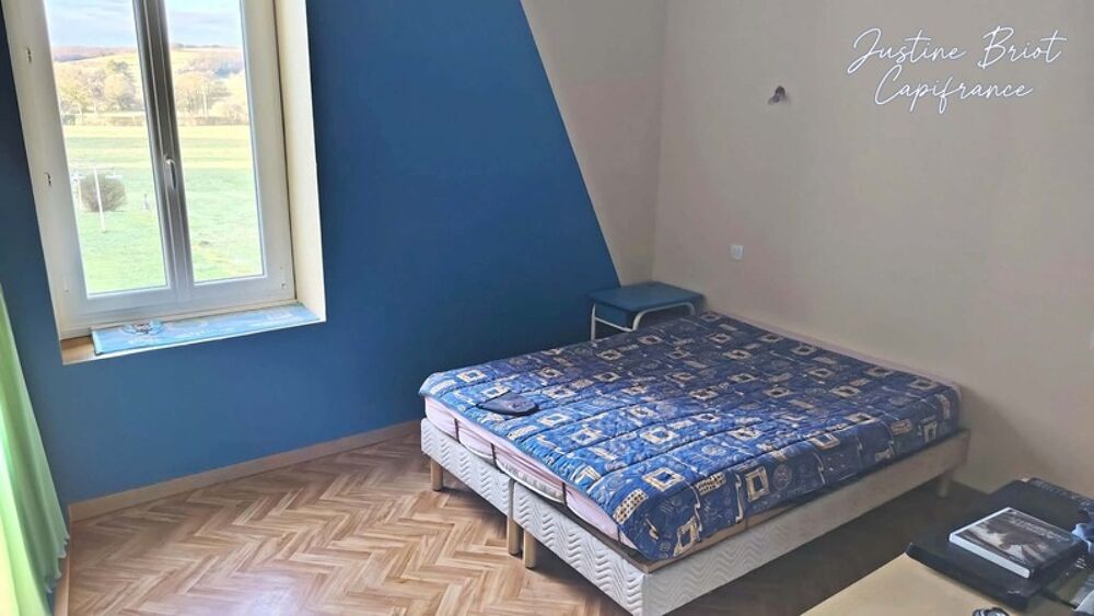 Une maison familiale aux beaux volumes, au coeur dun village où il fait bon vivre