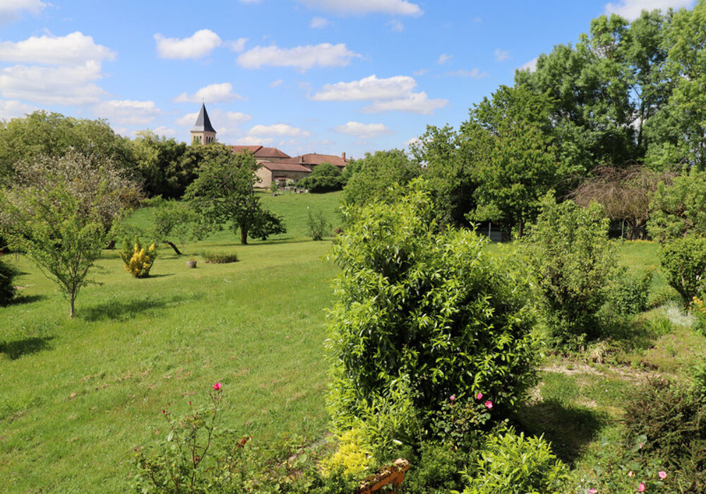 Jolie villa de 117 m² à fort potentiel avec un beau terrain arboré à CURCIAT DONGALON (01)