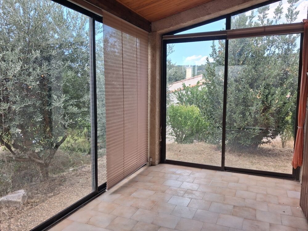 L'ESCALE  Maison individuelle avec véranda, garage et jardin arboré
