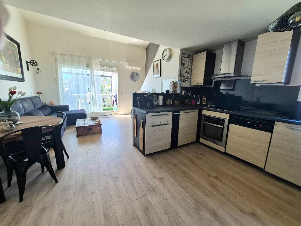 Appartement 3 pièce(s) 62 m2 avec terrasse et stationnement
