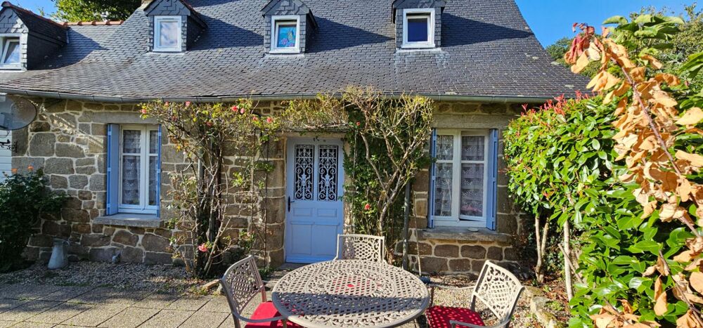 Maison en pierre en bourg
