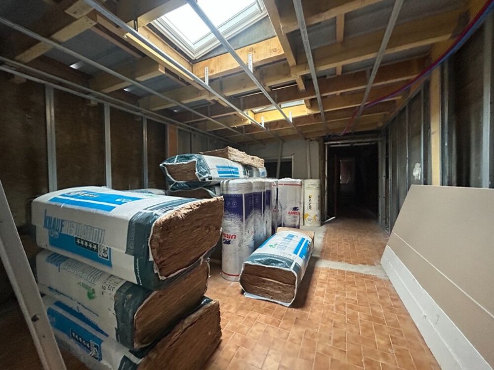 Maison de 105 m2 à finir de rénover avec jardinet