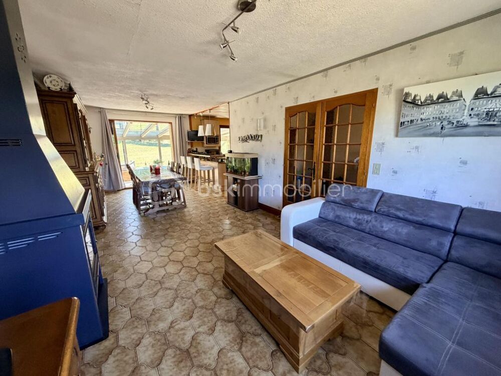 Maison 5 pièces avec véranda, sous-sol complet, grand garage et jardin