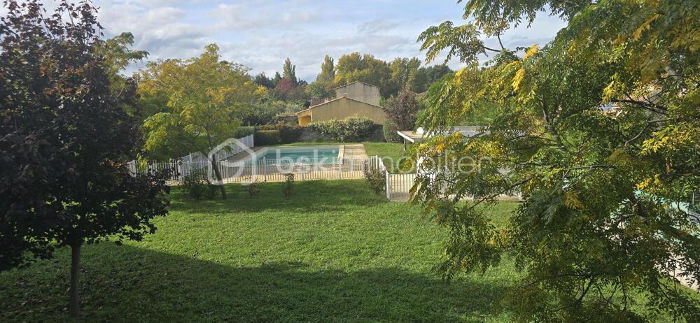 Appartement T3 avec balcon, piscine et parking  Avignon Pont des Deux Eaux