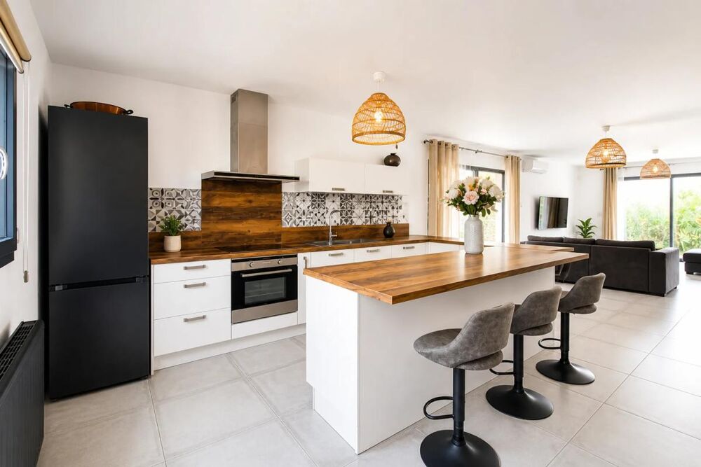 Maison 3 faces de plain-pied  3 chambres  Jardin  Garage