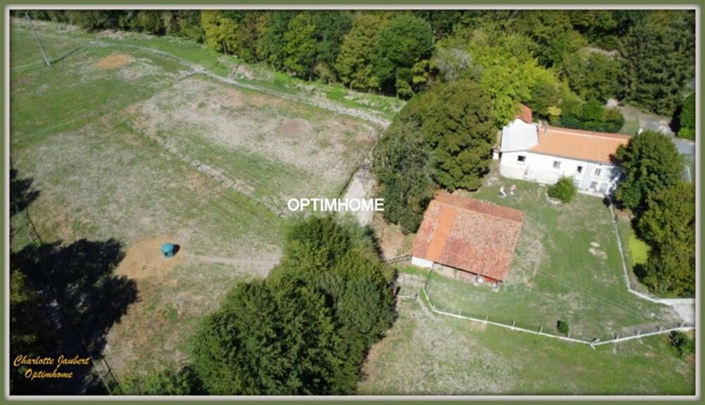 Ancien moulin rénové  3,7 hectares au calme avec dépendances équestres