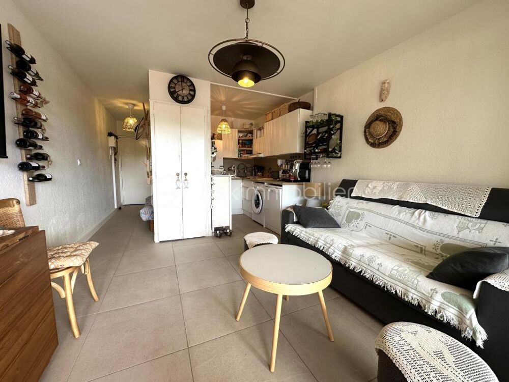 Élegant studio cabine avec terrasse et parking à quelques enjambées de la plage