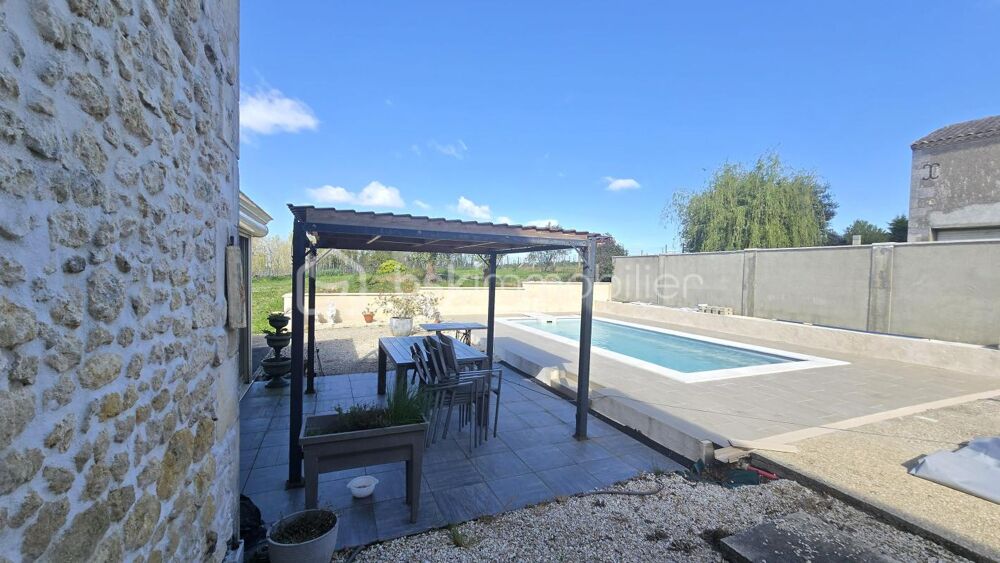 Maison en pierre avec 100m2 de dépendances