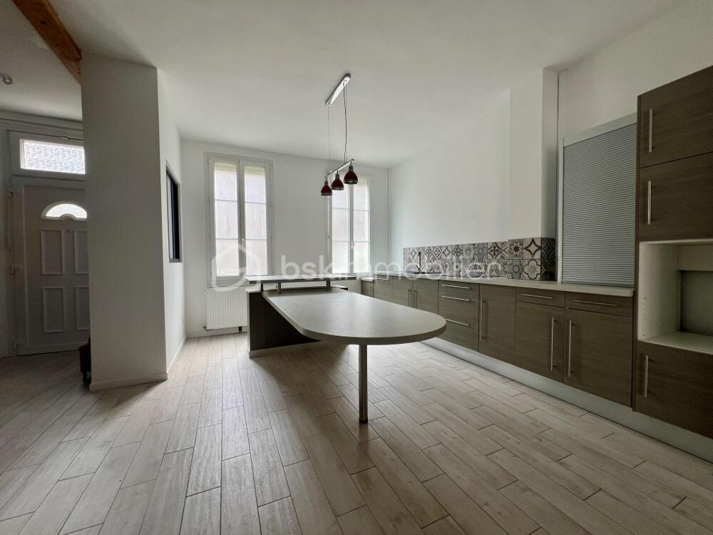 MAISON VIVABLE DE PLAIN-PIED 3 CHAMBRES  COEUR DE VILLE avec JARDIN