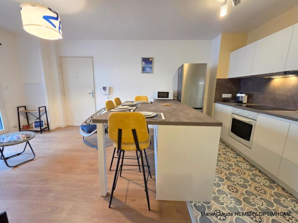 Vente Appartement DINARD – RUE GARDINER :Appartement entièrement rénové avec terrasse plein ouest et parking en sous-sol Dinard
