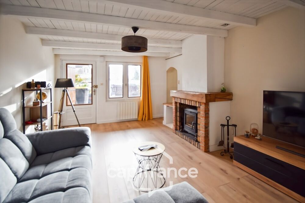 Maison de plain-pied entièrement rénovée avec jardin clos, dépendance et charme authentique  Secteur LONS LE SAUNIER (39000), B