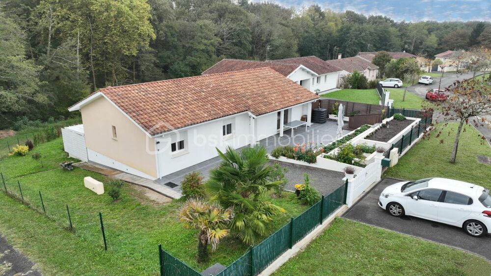 Maison lumineuse et fonctionnelle au calme, dans un environnement verdoyant