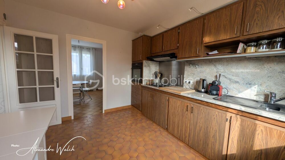 Charmante maison sur sous-sol semi enterré