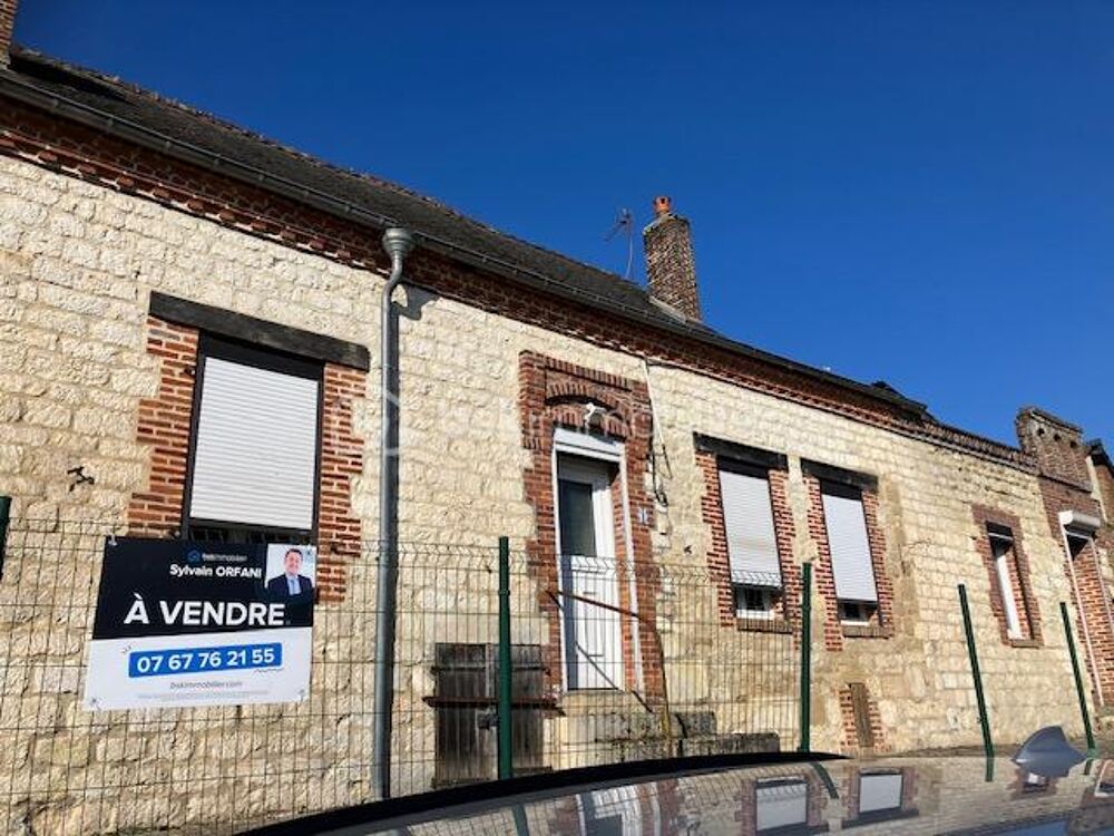 Maison dans village calme