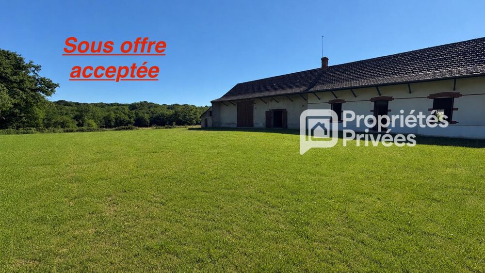 Sur 2700 m2 de terrain, belle ferme à rénover