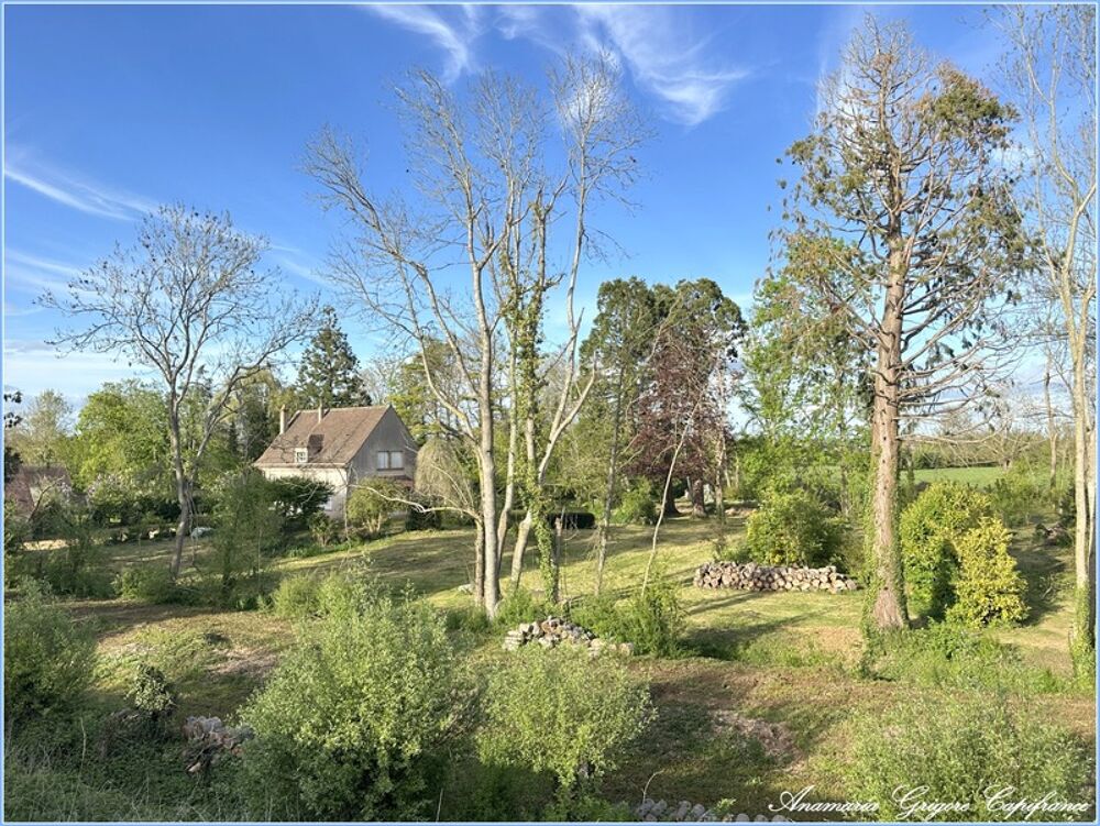 Courville-sur-Eure Maison familiale de 155 m², terrain arboré de 8317 m². Cadre exceptionnel et fort potentiel !