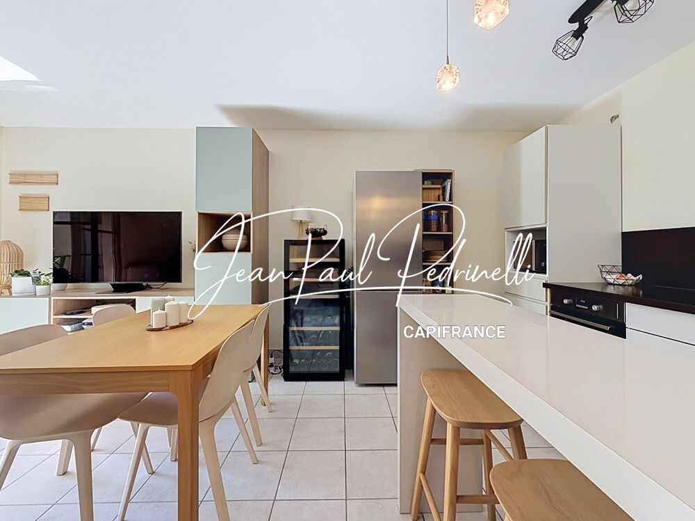 Tassin-la-Demi-Lune - Appartement 2 pièces de 48 m² avec balcon, parking privatif et cave - résidence sécurisée récente