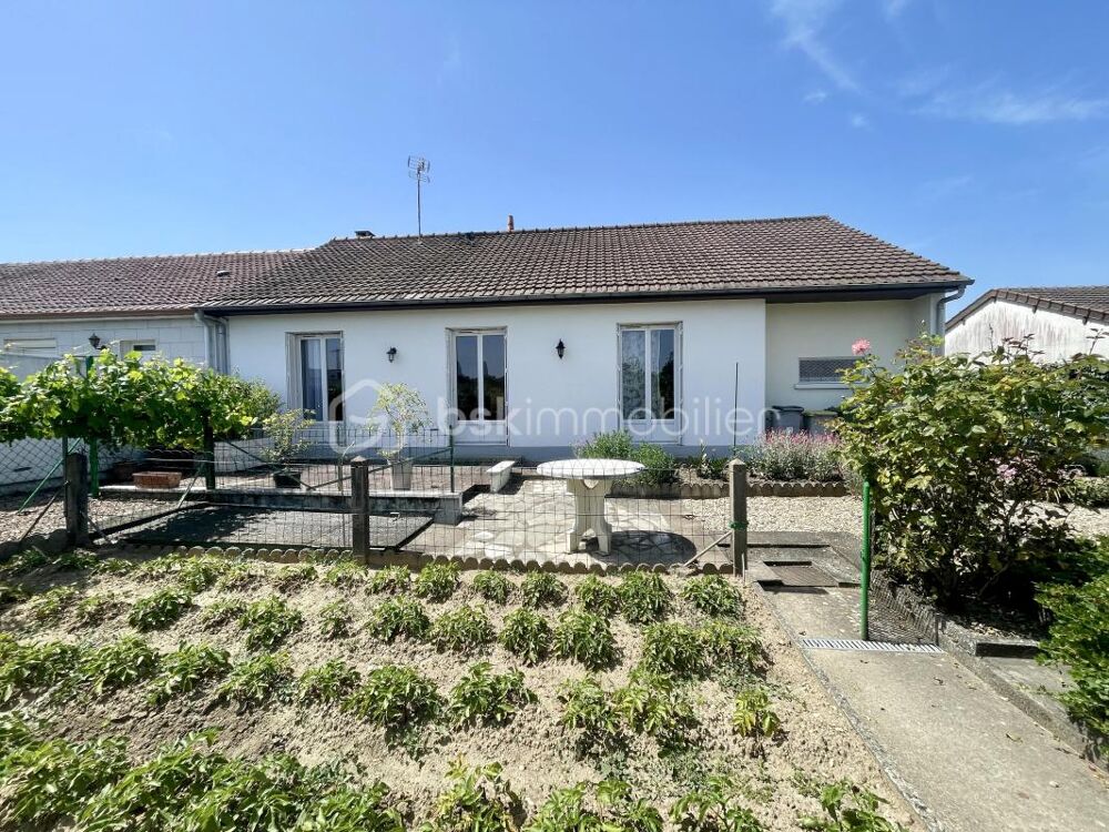Maison de plain-pied avec garage et vue agréable sur parc