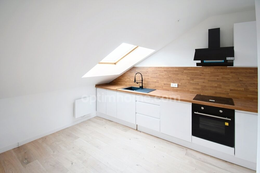 APPARTEMENT AU DEUXIEME ET DERNIER ETAGE - 2 CHAMBRES - PLACE PARKING - CAVE - REFAIT A NEUF
