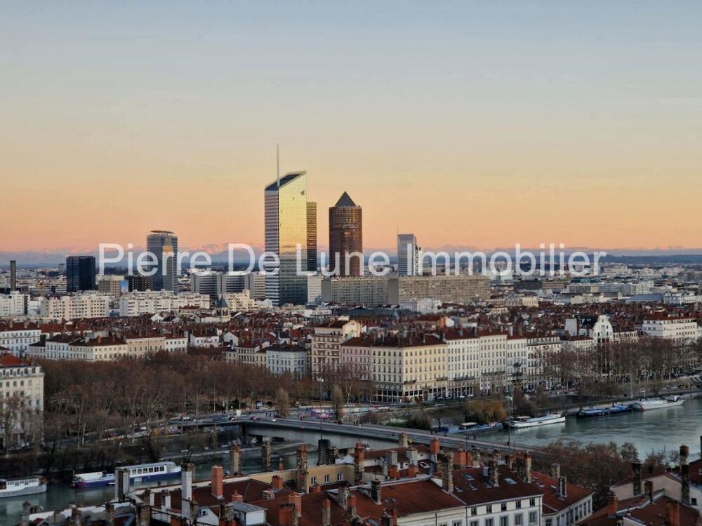 LYON 1ER DERNIER ÉTAGE ASCENSEUR 90 M² UTILES VUE EXCEPTIONNELLE