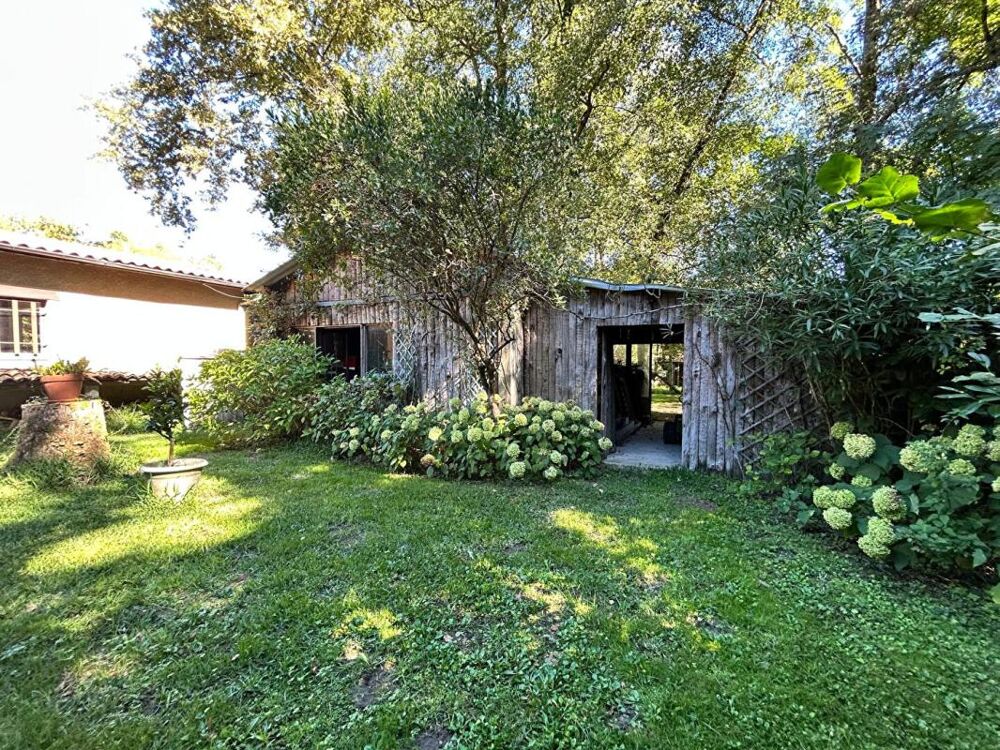 DÉCOUVREZ LE CHARME ET LES VOLUMES D'UNE MAISON CONTEMPORAINE 208 M2 - 4 CHAMBRES À AUBIE ( VAL DE VIRVÉE) DANS UN PARC ARBO