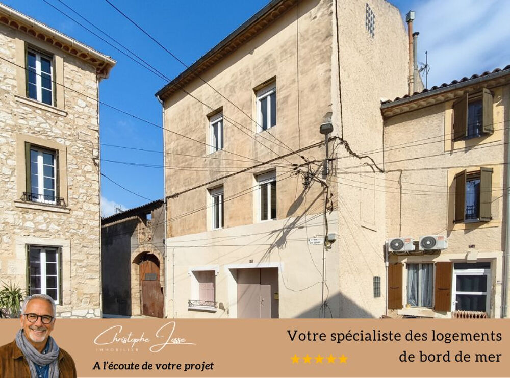 Maison de village avec garage 3 voitures, dépendances, caves et vastes terrasses