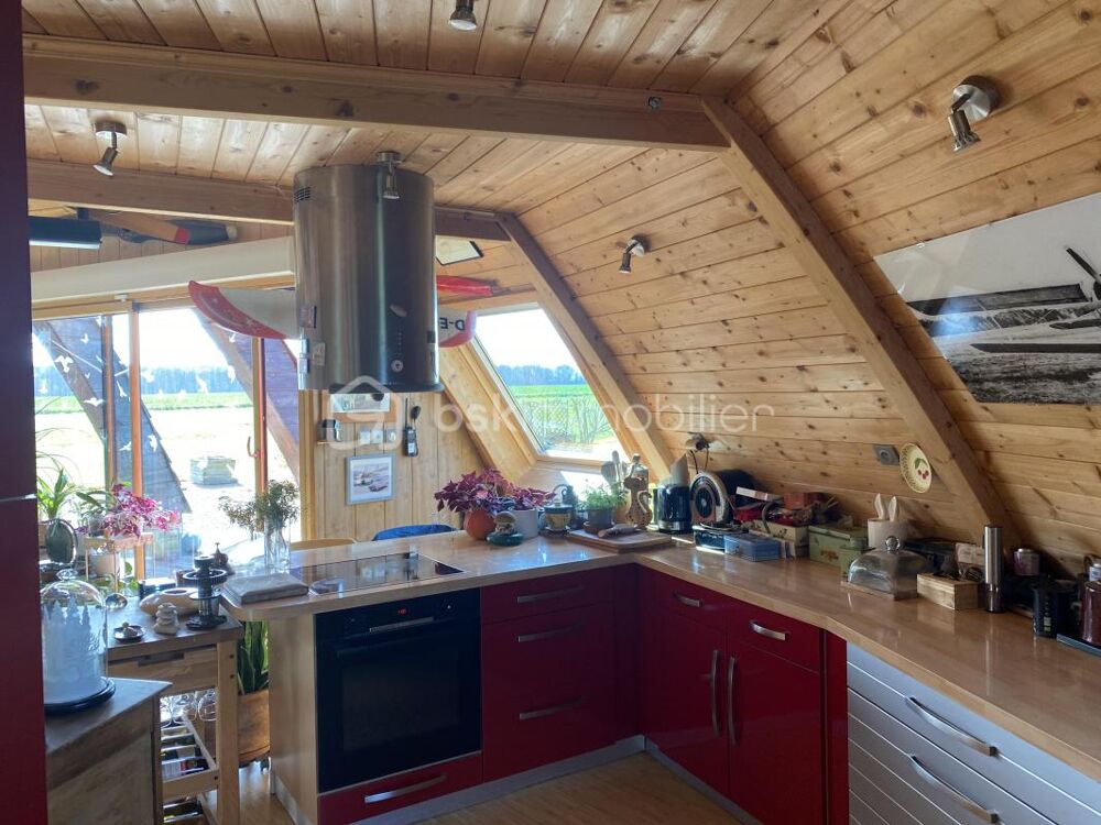 MAISON RONDE EN BOIS QUI TOURNE AVEC LE SOLEIL