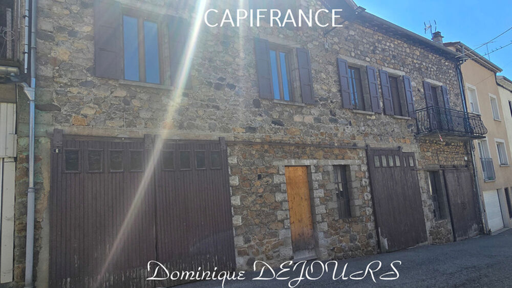 Maison composée de 2 appartements (57 et 43m²) et d'un grand garage de 100m²