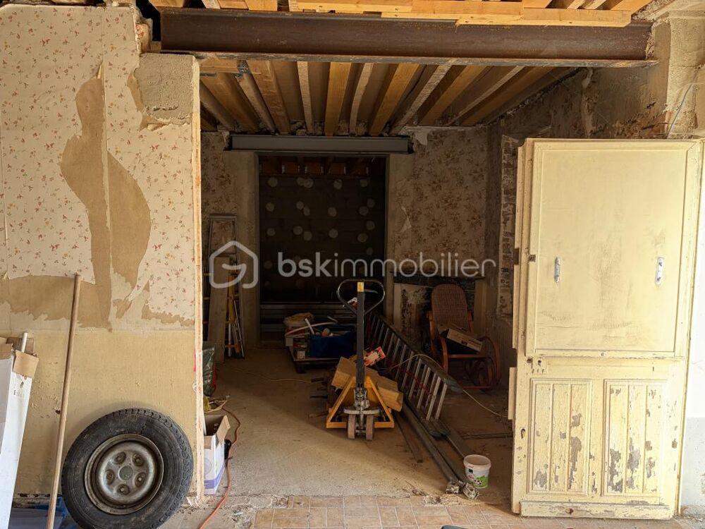 Maison à rénover située dans un environnement calme avec son jardin intimiste !