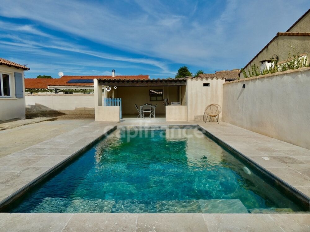 Maison de 93 m² climatisée avec piscine et dépendance de 50 m² sur la commune de SAINT GILLES (30)